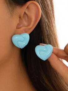 1 paire de boucles d'oreilles élégantes au design géométrique texturé, forme de cœur abstraite. Clips d'oreille polyvalents