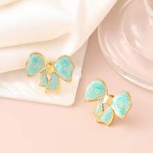 1 paire de boucles d'oreilles florales exquises à effet d'écoulement d'huile, clous d'oreilles élégants, uniques et délicats, de luxe. Bijoux de tempérament doux.