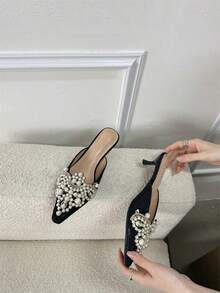 Fashion Pearl Bow Backless Mules For Women. Pointed Toe Slip-Ons. Comfortable Mid Heel. Holiday Casual High Heel Sandals. Perfect For Beach, Date, Shopping.