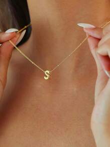 A Novel And Fashionable, Exquisite Copper Pendant Necklace With The English Letters "A-Z" Engraved On It And Featuring A Hole Design. It Is An Excellent Choice For Gift-Giving On Special Occasions And Also Suitable For Women To Wear Daily, For Casual Occasions.