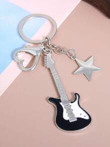 A Unisex Y2K Subculture Guitar And Five-Pointed Star Keychain A Retro Sweet And Cool Niche Bag And Car Pendant. It Serves As A Back-To-School Bag Pendant And A Couple's Keychain. Backpack Decor Keychain For Bag - Black and White - View 5