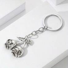 1 pieza Llavero con colgante de calavera vintage gótica y flor de cerezo con estilo hip hop vanguardista - Accesorio duradero de metal pulido para coche y bolso - Estilo Halloween