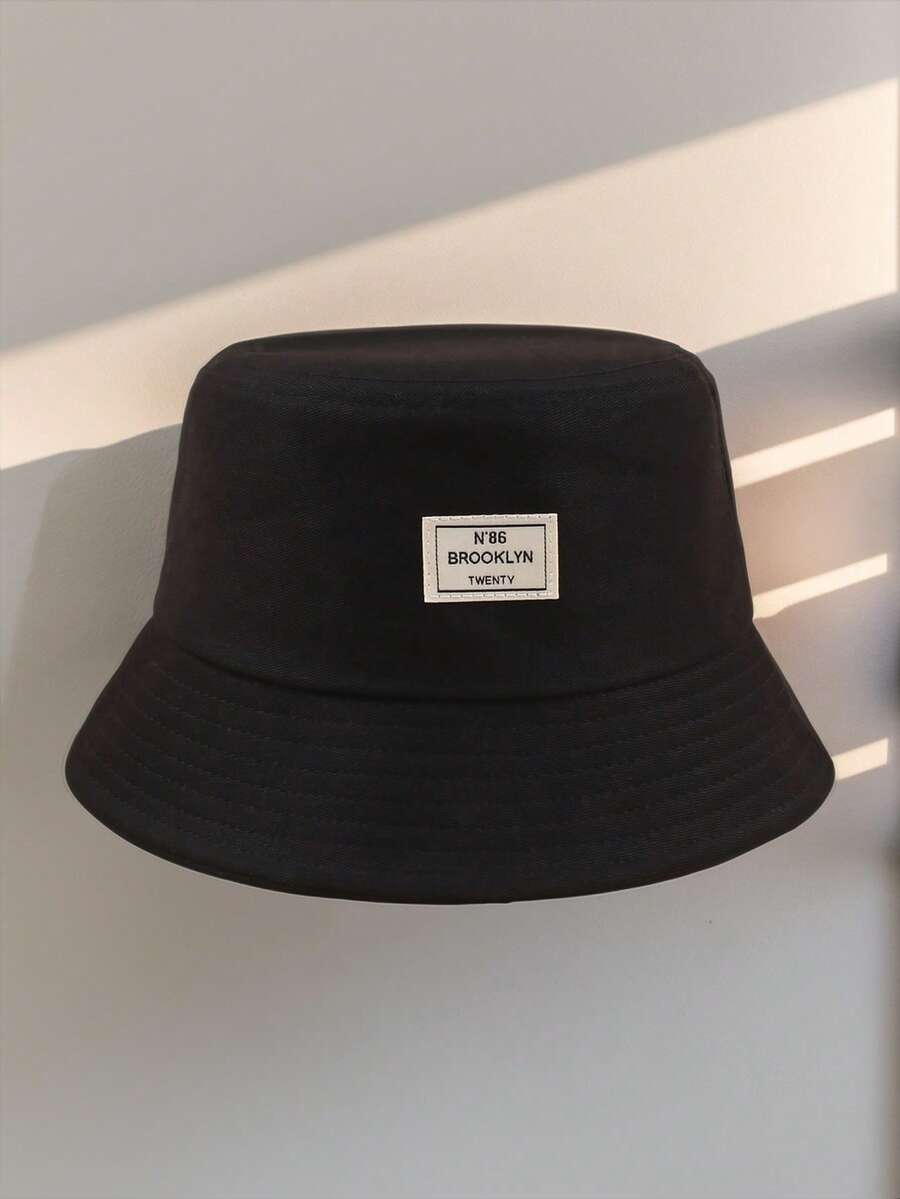 DareSee Sombrero de cubo con etiqueta de gráfico de letras, decoración, festival de música, Y2KFest, otoño, invierno, regalos, festival de música, Halloween - Negro - Ver 1