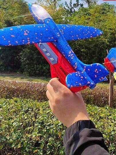 1 pieza Nuevo avión de juguete de 2026 con banda de goma multicolor, modelo de avión, juguete de avión de catapulta de plástico ABS, juguete de avión, pistola de avión, juguete interactivo para exteriores, distancia de vuelo ultra larga, sin batería, lanzador de vuelo remoto, planeador, lanzamiento manual, regalo de cumpleaños, regalo de Pascua, regalo de Navidad. El color del avión es aleatorio - El color del lanzador es aleatorio