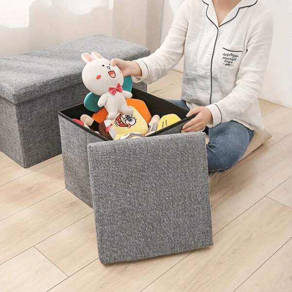 Versátil otomana de almacenamiento plegable - Reposapiés de tela que ahorra espacio con organizador incorporado para ropa, mantas, juguetes para el hogar, oficina, sala de estar, dormitorio, dormitorio. Taburete de almacenamiento de tela plegable multifuncional Caja de almacenamiento de calzado Caja organizadora de juguetes Organizador de hogar Taburete de almacenamiento plegable multifuncional