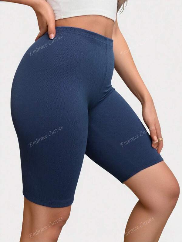 Pantalones cortos de mujer de talla grande con alta elasticidad y longitud hasta la rodilla, diseño de efecto de mezclilla en tejido impermeable, ajuste ceñido, leggings de punto casual y cómodos
