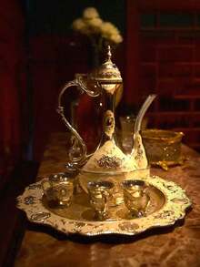 1 套豪华欧式金属茶具，1 个珐琅雕刻茶壶，1 个托盘和 6 个茶杯，适合优雅的家居装饰，日常喝茶或喝咖啡