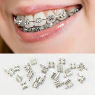 20 قطعة/مجموعة ألوان وأنماط عشوائية من مصحح الأسنان المعدني أحادي الوحدة ذو خطاف صغير من نوع MBT لمجموعة مواد علاج الأسنان