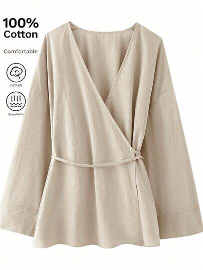 优雅长袖落肩女式衬衫，喇叭下摆和裹身设计