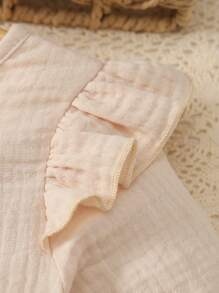 MommBaby Pelele de algodón de un solo color para bebé, mono con mangas largas y botones delanteros con volantes, pantalones con entrepierna abierta para gatear para niñas bebés, para primavera y otoño
