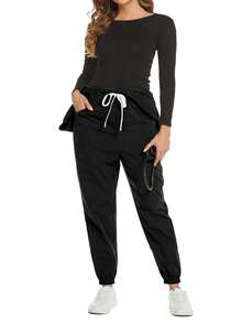 Cimmuovere Mono de talla grande con manga corta, cintura anudada, pliegues, cremallera y cuello alto - Negro - Ver 6