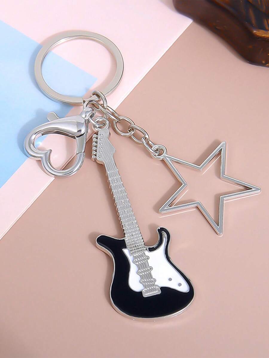 A Unisex Y2K Subculture Guitar And Five-Pointed Star Keychain A Retro Sweet And Cool Niche Bag And Car Pendant. It Serves As A Back-To-School Bag Pendant And A Couple's Keychain. Backpack Decor Keychain For Bag - Black and White - View 1