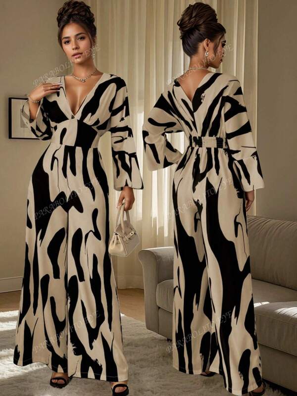 Mono estampado asimétrico elegante y de moda para mujer, versión suelta, temperamento de moda y adelgazamiento, pantalones anchos y drapeados elegantes de alta gama, estilo europeo y americano para modificar la forma del cuerpo.