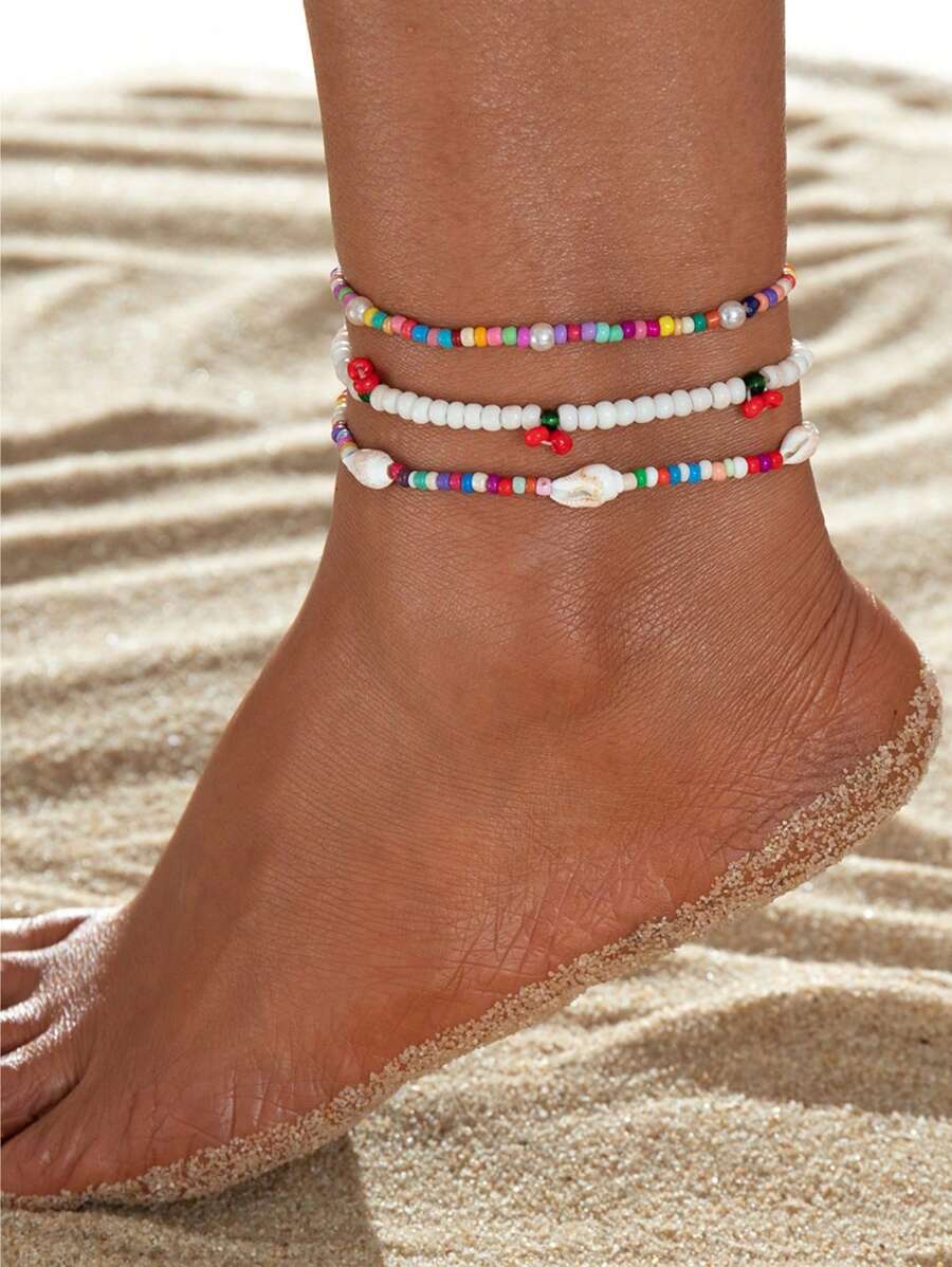 3 pezzi Set di cavigliere bohémien con conchiglie naturali colorate, perle finte e ciondoli a forma di ciliegia, adatto per indossare in vacanza al mare