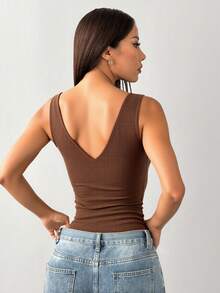 Gładka, swobodna dzianinowa bluzka z kieszenią na guziki i zamkiem błyskawicznym