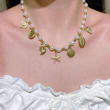 1 set d'une seule pièce composé d'un collier pendentif de style océan, de bijoux pour femmes en perles synthétiques CCB à la mode et d'une chaîne de clavicule convient à un usage quotidien et aux photos de vacances à la plage.