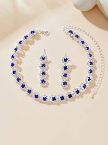 1 Set de joyas de 3 piezas con collar, pulsera y aretes con cristal azul de strass con diseño ondulado