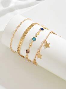 4件套迷人多层金色脚链，镶嵌彩色水晶钻和流苏，时尚女士海滩派对首饰套装，适合日常、派对和节日佩戴。手工链条上的珠子数量可根据长度调整，彩色玻璃钻的颜色排列随机。