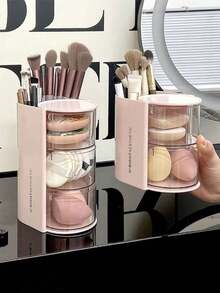 1 pièce Boîte de rangement 2-en-1 pour éponge et houppette de maquillage rotative, organisateur de bureau de coiffeuse élégant et anti-poussière pour éponges de maquillage, coussinets, rouges à lèvres et pinceaux de maquillage. Parfait pour les passionnés de beauté et les professionnels. Cadeau idéal pour les fêtes et les occasions spéciales. Améliorez votre routine de maquillage avec cet organisateur chic et fonctionnel. - Boîte de rangement multicolore - Voir 3