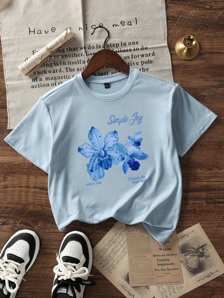 Dziewczęca koszulka z krótkim rękawem i okrągłym dekoltem w kolorze jasnoniebieskim, z nadrukiem, letnia bluzka