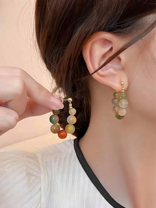 A Pair Of Retro New Chinese-Retro Style Colorful Beaded Earrings With Unique Design And Elegant Charm.