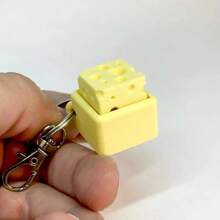 Tastiera meccanica creativa a forma di formaggio per alleviare lo stress, giocattolo da spremere per liberare la noia delle dita, regalo