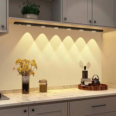 可充电LED人体感应灯，自粘式，无线设计，适用于橱柜、鞋架、玄关等场所，三种颜色可选，猫眼造型，装饰照明，室内外均可使用。厨房、卧室和衣橱的必备家居装饰品。