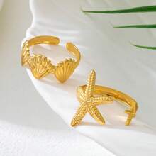 2pcs Fashionable Coastal Beach Theme Golden Metallic Seashell & Starfish Rings Set, Suitable For Daily Wear, Banquet, Party, Beach