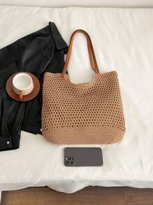 Sac à main de style vacances bord de mer à la mode et polyvalent avec un design ajouré grande capacité, léger et portable, style de sac de plage. Sac à bandoulière à double poignée, un sac de voyage indispensable, convient pour les vacances au bord de et les voyages.