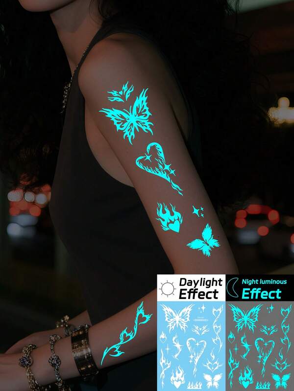 1 ورقة من الوشم المؤقت الذي يضيء في الظلام باللون الأزرق للنساء - تصميم فراشة وقلب للوجه والصدر والذراعين واليدين والأصابع - مناسب للأعراس والنوادي الليلية والحفلات، ديكور هدية الحفلة | فن الجسم الحيوي | سهل التطبيق، وشم فراشة