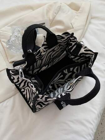 时尚新款女士斑马纹图案字母印花装饰手提单肩包轻便便携休闲女包手提包适合旅行购物