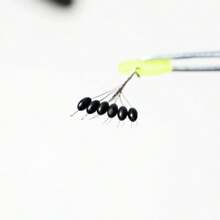 Conjunto de 60 peças de equipamento de pesca de carpa de borracha com 10 grãos espaciais, rolha oval de borracha preta, bóia de pesca, batentes de linha de flutuação de bobber