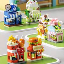 一套创意街景积木，包含一家花店、一家奶茶店、一家咖啡店、一家汉堡店、一家炸鸡店和一家蛋糕店。适合用作桌面装饰和可爱摆件。生日礼物、万圣节礼物、圣诞节礼物、派对礼物、女孩玩具、可爱玩具。