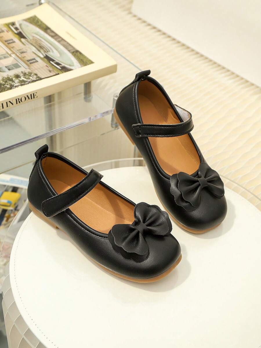 1 Pair Black Bow Decor Children's Shoes, Adjustable Strap, Round Toe, TPR Non-Slip Comfortable, Lightweight, Solid Color Ballet Flats Suitable For 5-14 Years Old Girls, School, Performance, Indoor & Outdoor Activities, All Seasons - Black - View 1