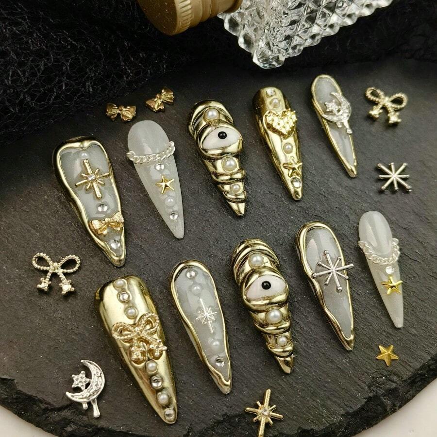 10pcs Gold 3D Decorative Press On Nails Handmade Acrylic French Y2K Style Milky White Nude Color Stiletto Full Coverage Fake Nail Set With Pearl Star Bow Moon Eye Cross Details Luxury Cute Press On Nails For Valentine's Day Gifts Easter Party Wedding Daily Wear Comes With Mini Nail File And Double Sided Adhesive Tabs - 金色 - 查看 1