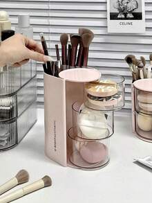 1 pièce Boîte de rangement 2-en-1 pour éponge et houppette de maquillage rotative, organisateur de bureau de coiffeuse élégant et anti-poussière pour éponges de maquillage, coussinets, rouges à lèvres et pinceaux de maquillage. Parfait pour les passionnés de beauté et les professionnels. Cadeau idéal pour les fêtes et les occasions spéciales. Améliorez votre routine de maquillage avec cet organisateur chic et fonctionnel. - Boîte de rangement multicolore - Voir 9