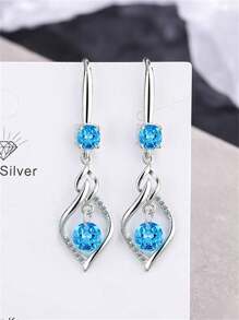 1 paire de boucles d'oreilles élégantes et à la mode avec zircone bleue et gland tourbillonnant. Convient pour le port quotidien, les fêtes et les voyages des femmes. Cadeau de bijoux pour la petite amie, à porter en rendez-vous