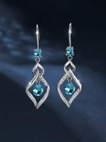 1 paire de boucles d'oreilles élégantes et à la mode avec zircone bleue et gland tourbillonnant. Convient pour le port quotidien, les fêtes et les voyages des femmes. Cadeau de bijoux pour la petite amie, à porter en rendez-vous