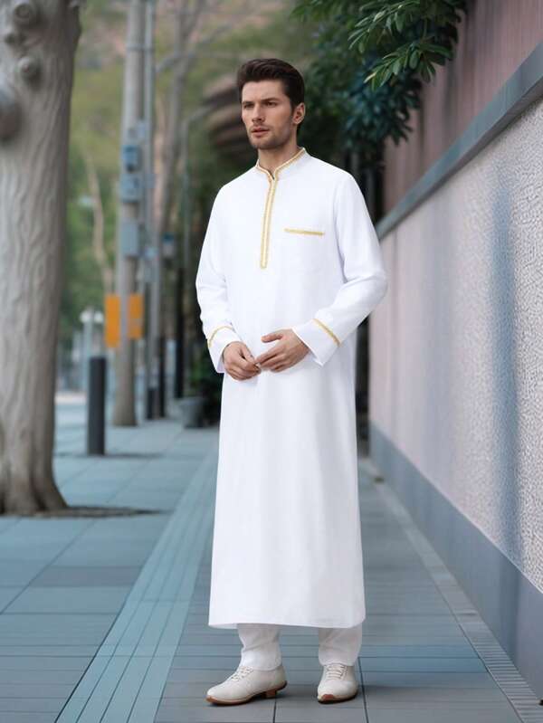 Ein langer arabischer Männermantel mit stehendem Kragen. Der Stoff ist hautfreundlich und weich, geeignet für tägliche Anlässe wie Eid al-Fitr, Ramadan, Hochzeiten usw.