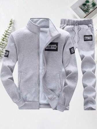 Conjunto de ropa deportiva informal de primavera/otoño para adolescentes compuesto por una sudadera con cuello alto, puños y bajo acanalados, estampado de letras gris, y pantalones con cordón en la cintura y ajuste ceñido