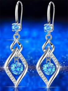 1 paire de boucles d'oreilles élégantes et à la mode avec zircone bleue et gland tourbillonnant. Convient pour le port quotidien, les fêtes et les voyages des femmes. Cadeau de bijoux pour la petite amie, à porter en rendez-vous