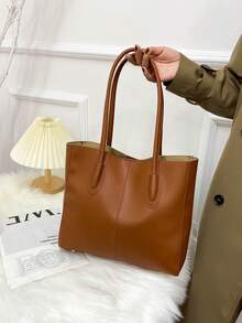 Eine minimalistische und vielseitige Schultertasche mit großem Fassungsvermögen, praktisch für den täglichen Arbeitsweg, Einkaufen, den Unterrichtsbesuch und geeignet für einen akademischen Stil. Sie ist perfekt für alle Jahreszeiten und ideal für Frauen, die ein einfaches und praktisches Design bevorzugen. - Braun - Übersicht 2