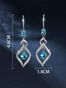 1 paire de boucles d'oreilles élégantes et à la mode avec zircone bleue et gland tourbillonnant. Convient pour le port quotidien, les fêtes et les voyages des femmes. Cadeau de bijoux pour la petite amie, à porter en rendez-vous