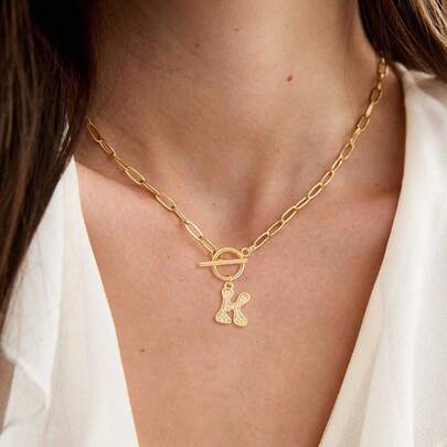 1 chiếc mặt dây chuyền hình trái tim đính đá Zirconia kiểu cổ điển mới, khóa cài dạng kẹp giấy bằng thép không gỉ mạ vàng, dành cho nữ.