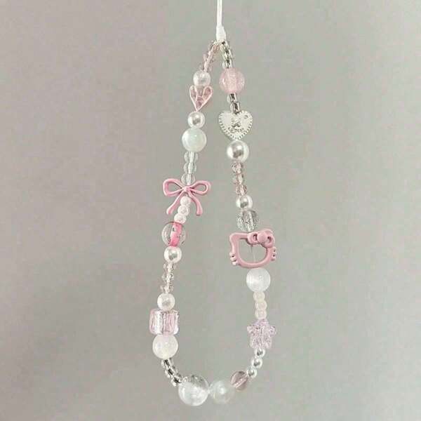 Sanrio Portachiavi con ciondolo a catena per telefono Hello Kitty di Sanrio - Graziosa catena rosa con perle e ciondoli a forma di cuore, gioiello in resina ABS durevole per donne, ragazze e fan di Sanrio - Regalo per compleanni, San Valentino