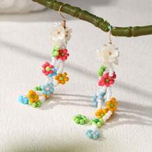 1 Pair Of New Bohemian Hand-Woven Flower-Shaped Ladies Earrings (Small Flowers With Random Colors)