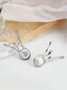 Boucles d'oreilles géométriques asymétriques en perles à la mode