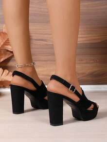 女式黑色新款时尚舒适休闲百搭性感派对圆头交叉带镂空系带扣设计高台粗跟凉鞋