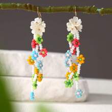 1 Pair Of New Bohemian Hand-Woven Flower-Shaped Ladies Earrings (Small Flowers With Random Colors)