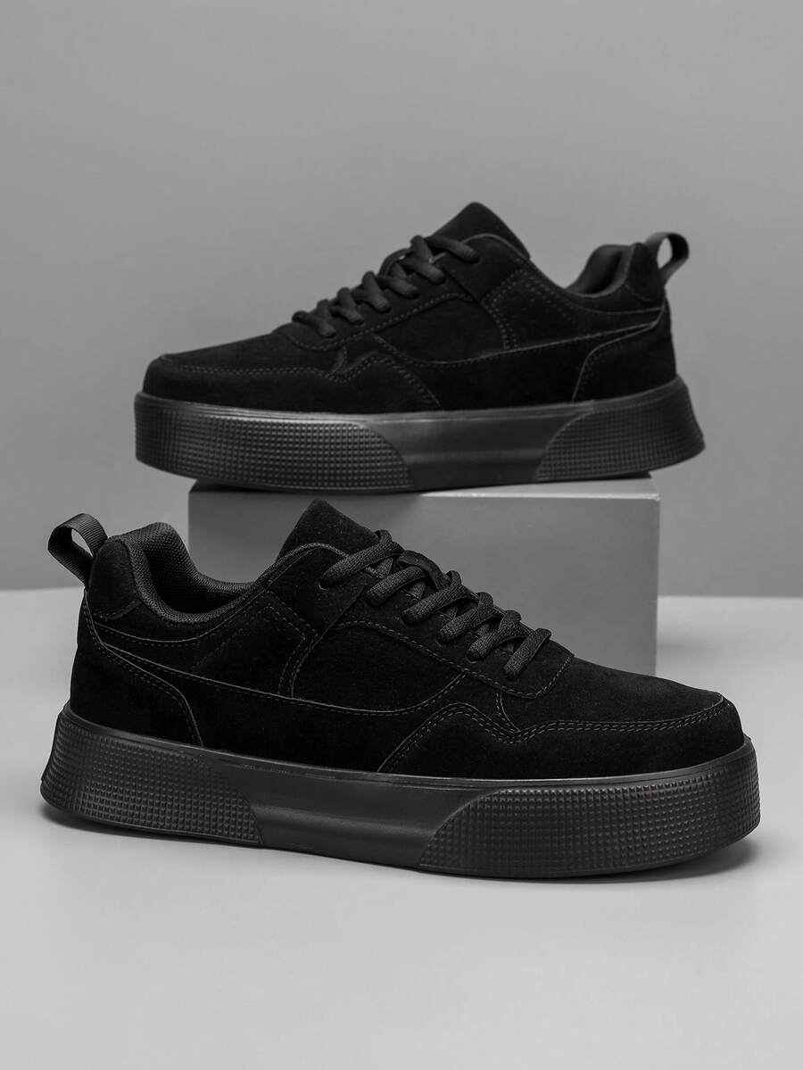 Giày thể thao nam cổ thấp buộc dây, kiểu dáng tối giản, màu trơn, phối nhiều mảng màu, đa năng, thoải mái khi mang hàng ngày, lý tưởng để phối cùng quần jeans và các hoạt động thể thao.